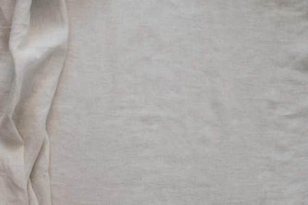 Abstract linen fabric texture background. Natural light brown hue dyed linen fabric background. Top viewの写真素材