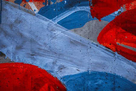Messy paint strokes and smudges on an old grunge wall background. Creative modern urban city...