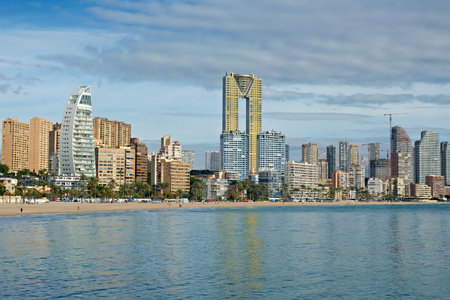Beautiful view to Mediterranean Sea and Benidorm resort city and Poniente beach. Benidorm is a popular coastal resort town in Alicante province, Spainの写真素材