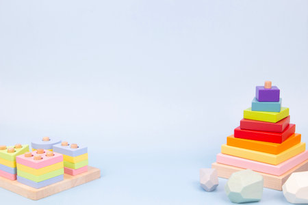 Wooden educational kid toys background. Montessori toys for educational and sensory play standing on...