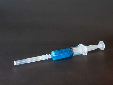 Syringes contain vaccines to prevent and treat diseases.
