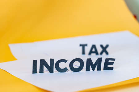 when doing business You probably focus on income. But you never focus on taxes. It's like an image that has only one focus.の写真素材