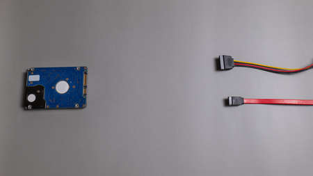 High angle view of HDD connection with SATA cable and power cable. using the correct type for use