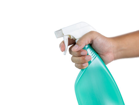 hand holding green spray bottle Various spray nozzles such as cleaning agentsの写真素材