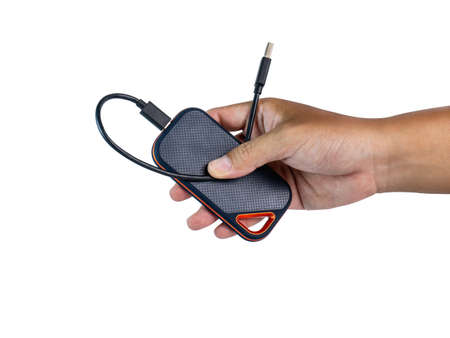Black external hard drive handle with USB cable version 3 Faster backup, studio shots.の写真素材
