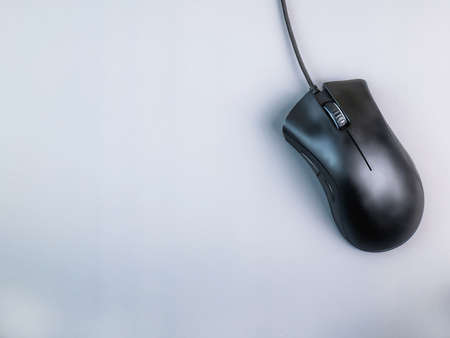 old black wired mouse Left and right click buttons Ready to use. There is a gray active area. There is a copy space to insert text. Business, shopping and gamingの写真素材