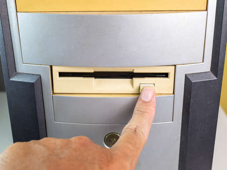 Hold the Floppy A disc and insert the reader. to read and write data It's technology old that have been used for a long time The disc will be less. has a square shape Must press a button to removeの写真素材