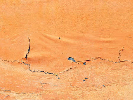 The wall surface that had been painted had started to peel off from the sun and rain as it was a wall outside the house. make it unsightlyの写真素材