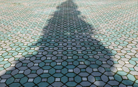 rough walking surface There is light and shadow on the walkway. During the day, it is the area of...