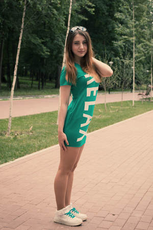 Model in the Park in full growth. Summerの写真素材