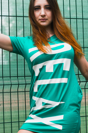 Model posing near the lattice. Summer shootの写真素材