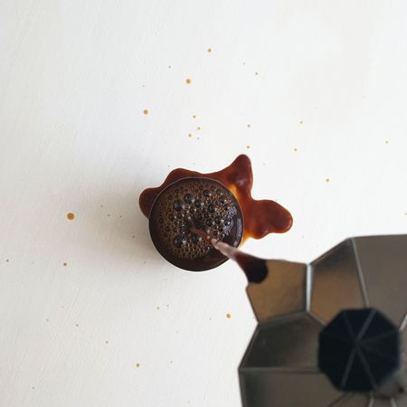 Spilled coffee or espresso. pouring moca. photoの写真素材