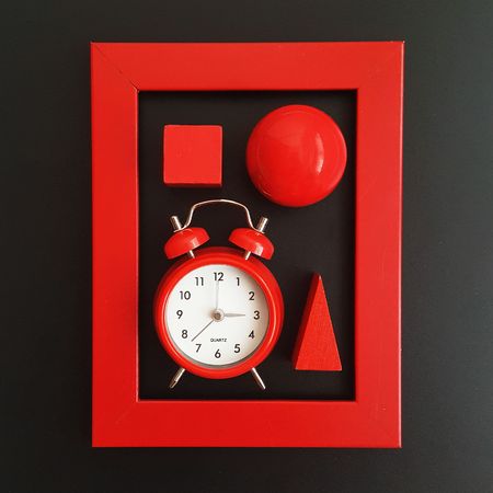 red color items. geomtric shapes. flatlay photo