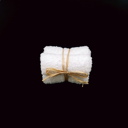 White towel for massage, spa and hotel resort. Isolated photoの写真素材