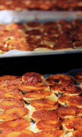 Slices of bread with a tomato pasteの写真素材