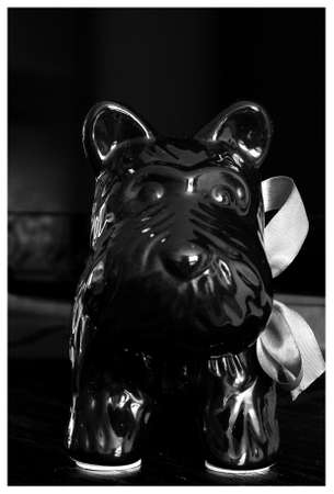 Dog.Stylish glossy figurine of a dog. Black and white photoの写真素材