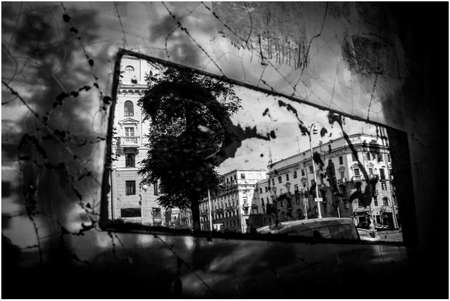 Vintage mirror with city traffic reflection in it