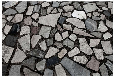 broken tiles on the road as backgroundの写真素材