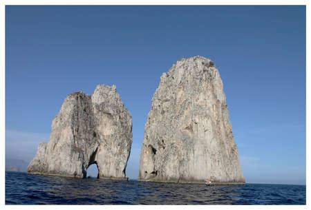 the Faraglioni rocks of Capri island view from the water close upの写真素材