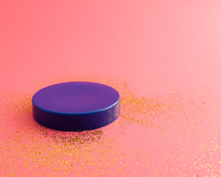 Purple pedestal on pastel pink background. Harmony of colors.の写真素材