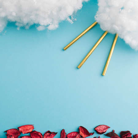 Abstract presetantion of clouds and sun. Minimal concept with blue background.の写真素材