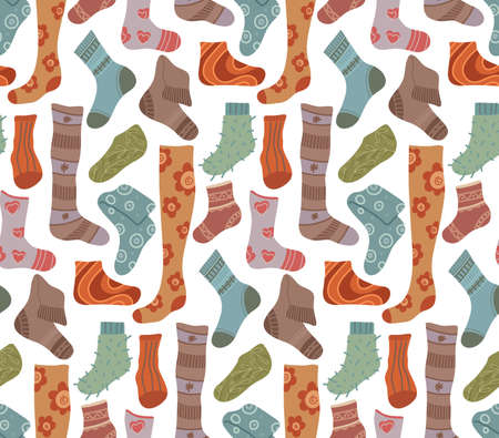 Vector seamless pattern with warm socks on white background. Texture with knitted clothes for legs. Wallpaper with stockings and golfs. Flat hand drawn background.のイラスト素材