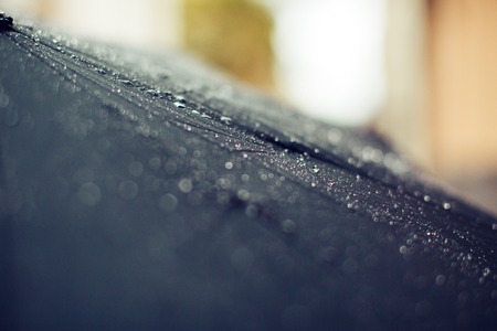 An umbrella and rain drops, close-up, soft-focusの写真素材