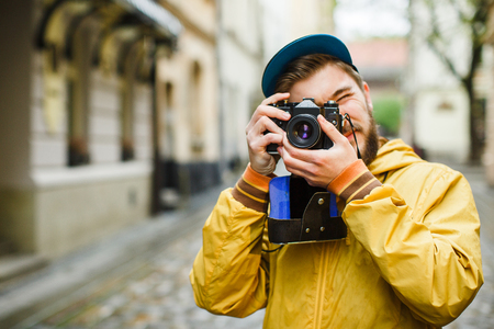 Young hipster ready to take a photoの写真素材