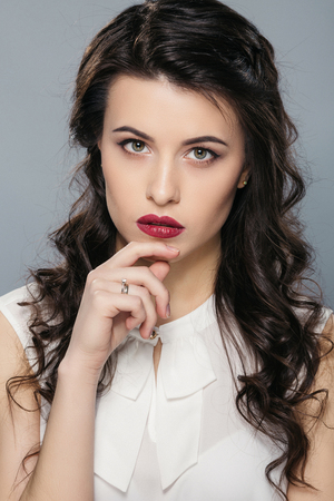 A portrait of beautiful brunette womanの写真素材
