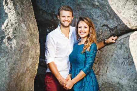 Nice couple looking at camera and smilingの写真素材