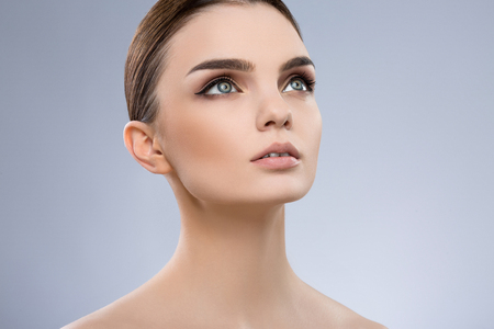 Beautiful girl with nude make up at studioの写真素材