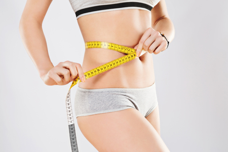 Fit girls body in gray underwearの写真素材