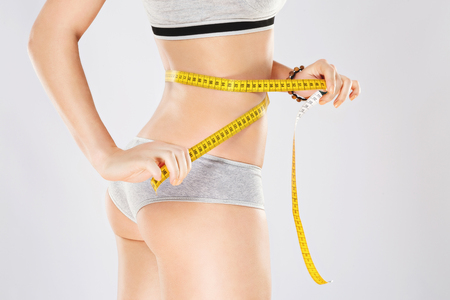 Fit girls body in gray underwearの写真素材