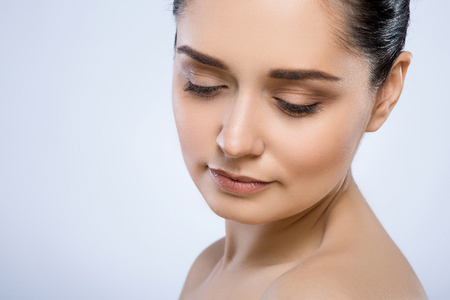 Beautiful girl with nude make up at studioの写真素材