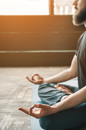 Young man practice yogaの写真素材