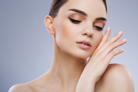 Beautiful girl with nude make up at studioの写真素材