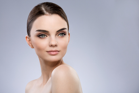 Beautiful girl with nude make up at studioの写真素材