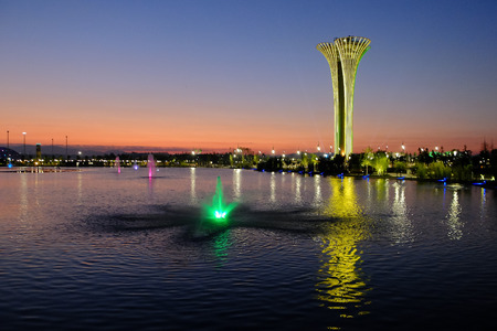 Tower and fountain illuminated, different colors, evening. Botanic Expo 2016.のeditorial素材