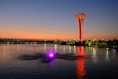 Tower and fountain illuminated, different colors, evening. Botanic Expo 2016.のeditorial素材