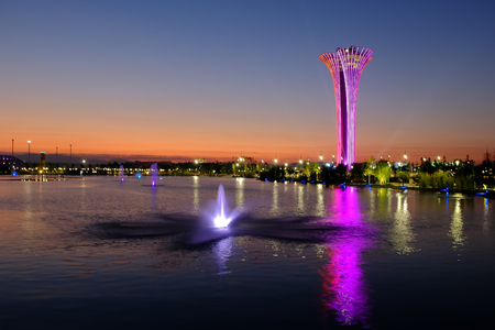 Tower and fountain illuminated, different colors, evening. Botanic Expo 2016.のeditorial素材