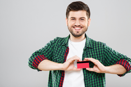 Man holding credit cardの写真素材