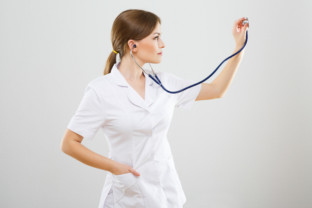 Attractive nurse with stethoscopesの写真素材