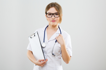 Pretty nurse at studio backgroundの写真素材
