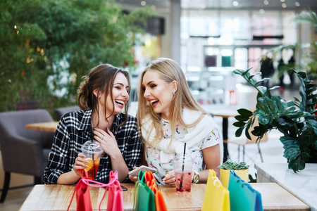 Gorgeous girls in shopping mallの写真素材