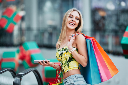 Cute girl posing at shopping mallの写真素材