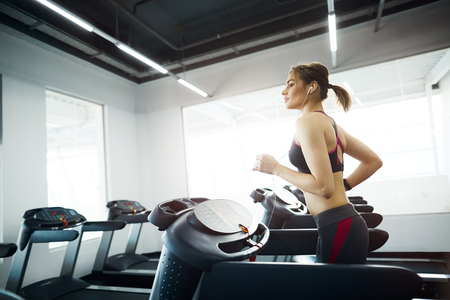Gorgeous girl doing sport in gymの写真素材