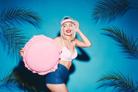 Sexy girl with huge macaroonの写真素材