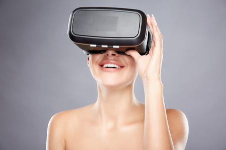 Close up portrait of girl wearing virtual reality glassesの写真素材