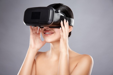 Girl wearing virtual reality glassesの写真素材