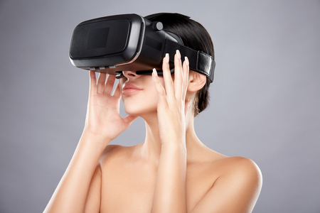 Girl wearing virtual reality glassesの写真素材